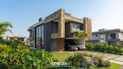Casa 4 suítes com ampla área social e alto padrão no Ilhas Park